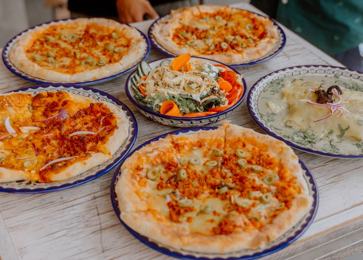 Variedade de pizzas no Parque Feliz